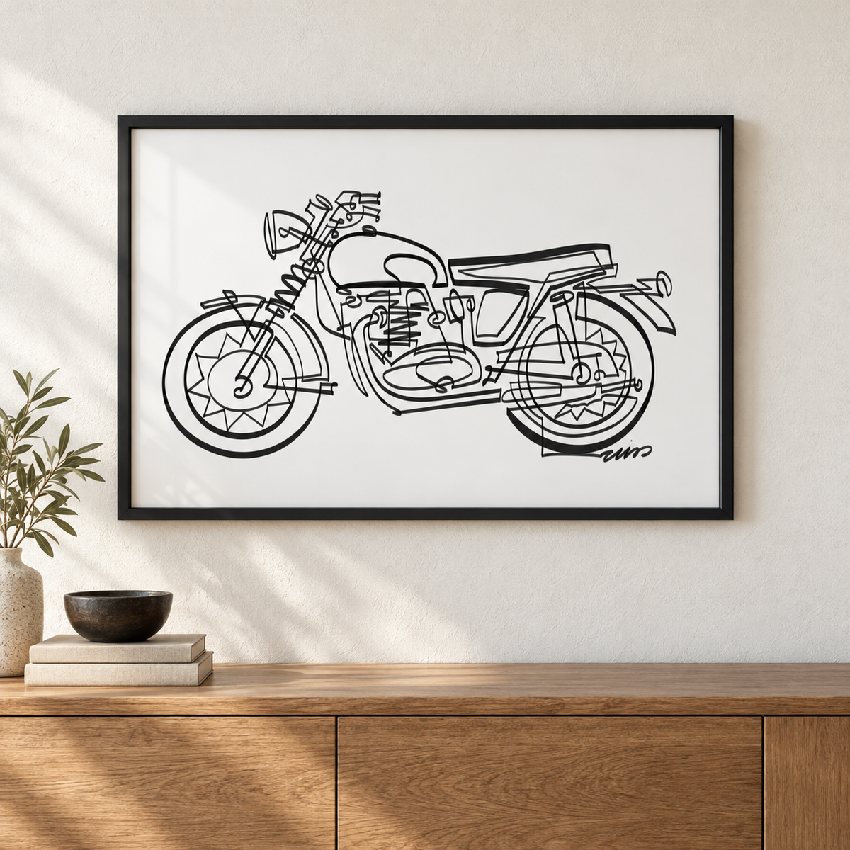 Classic Motorcycle art print by Cris D. in a black frame above an oak console. Illustrative interior; frame not included.